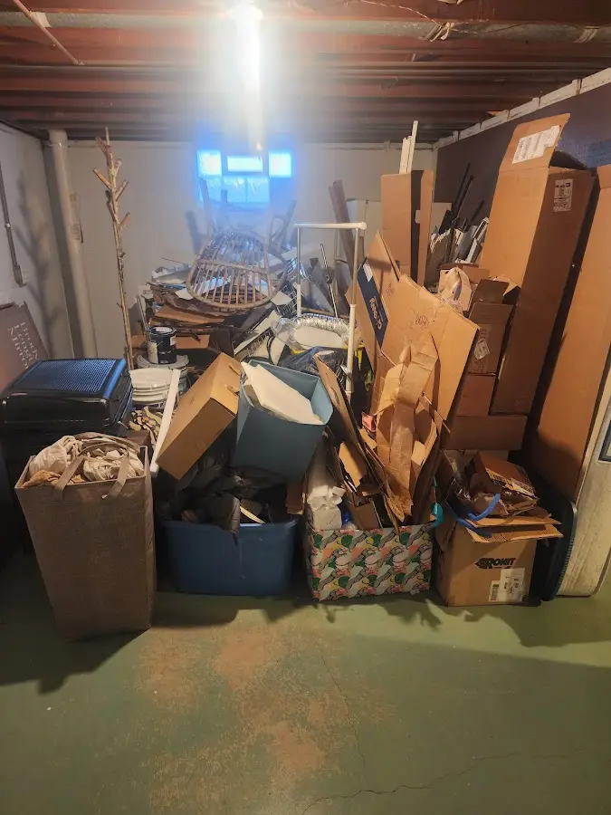 Roll-off dumpster container at job site for Construction Dumpster Rental in Royal Pines